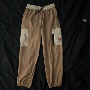 Nike Tan cargos with cream pockets